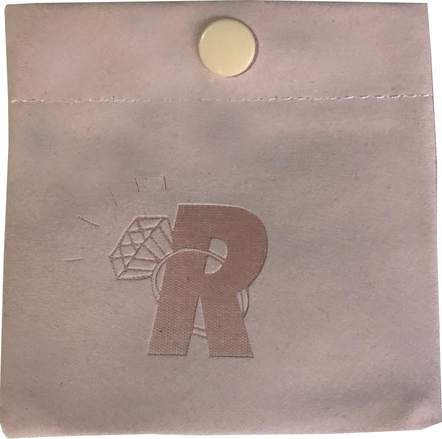 Embossed leather button bag Embossed leather button bag